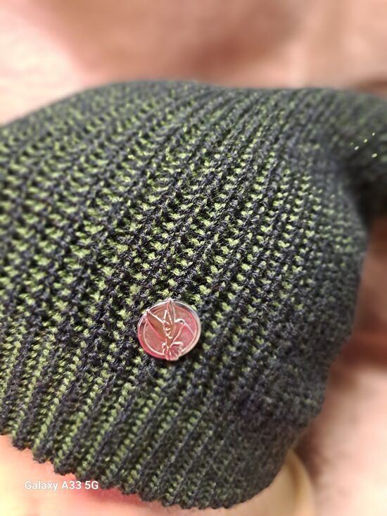 Cepure adīta sūnu krāsā